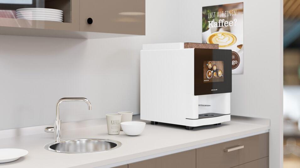 Kaffeevollautomat multiBona 3 in weiß lackiert steht auf Küchenzeile eines Büros
